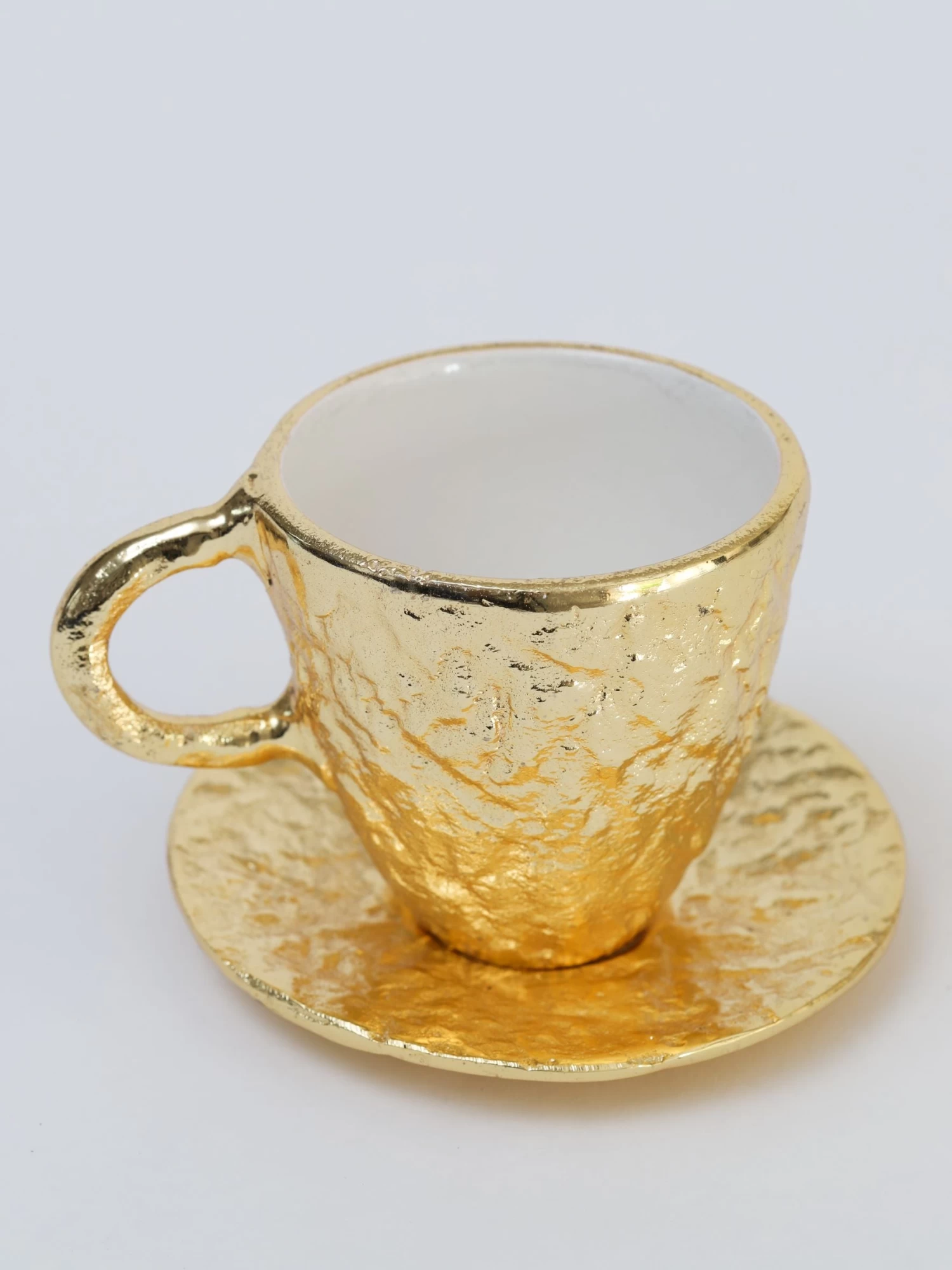 Gold Textured Metal Tea Cup And Saucer With White Interior 4 Gold Textured Metal Tea Cup And Saucer With White Interior - Image 2