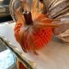 Orange Crochet Pumpkin With Feathers And Wood Stem