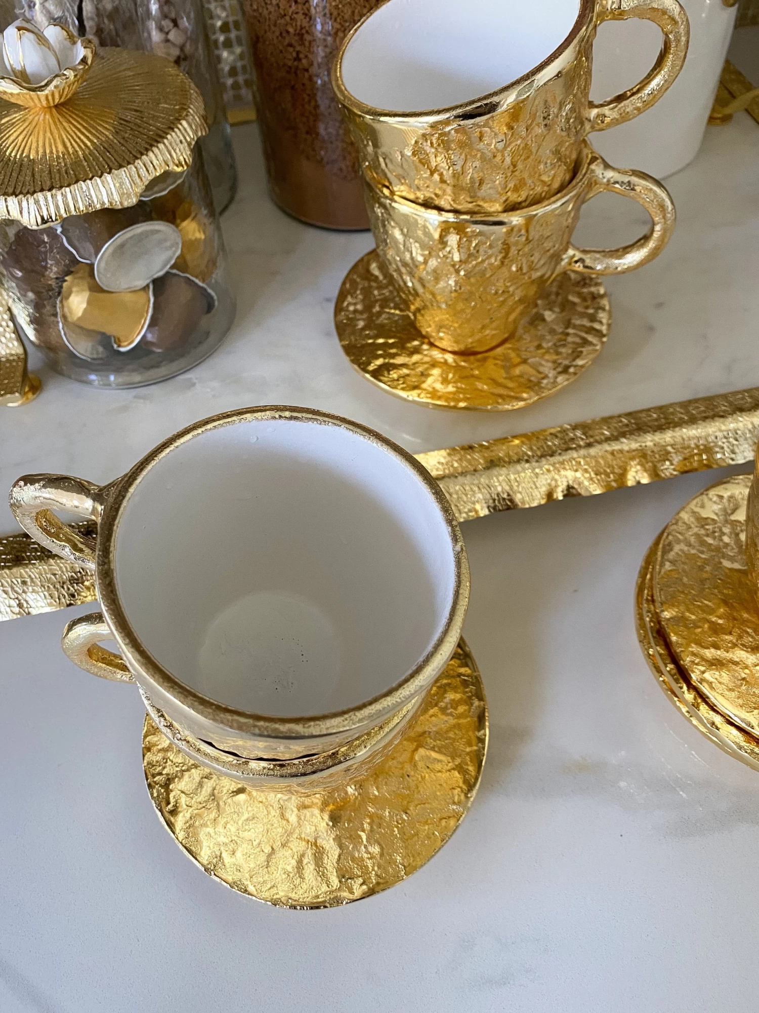 Gold Textured Metal Tea Cup And Saucer With White Interior 6 Gold Textured Metal Tea Cup And Saucer With White Interior - Image 4